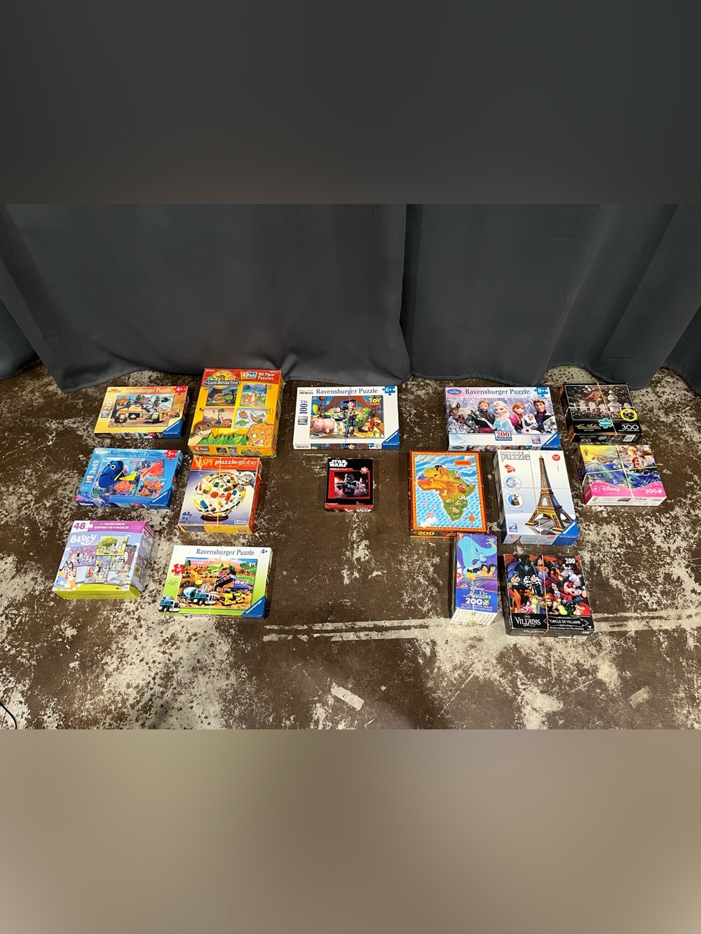 Lot of 14 48-300 piece jigsaw puzzles.